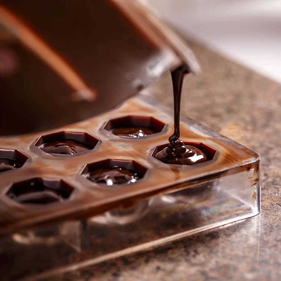 Compact chocolate moulding system