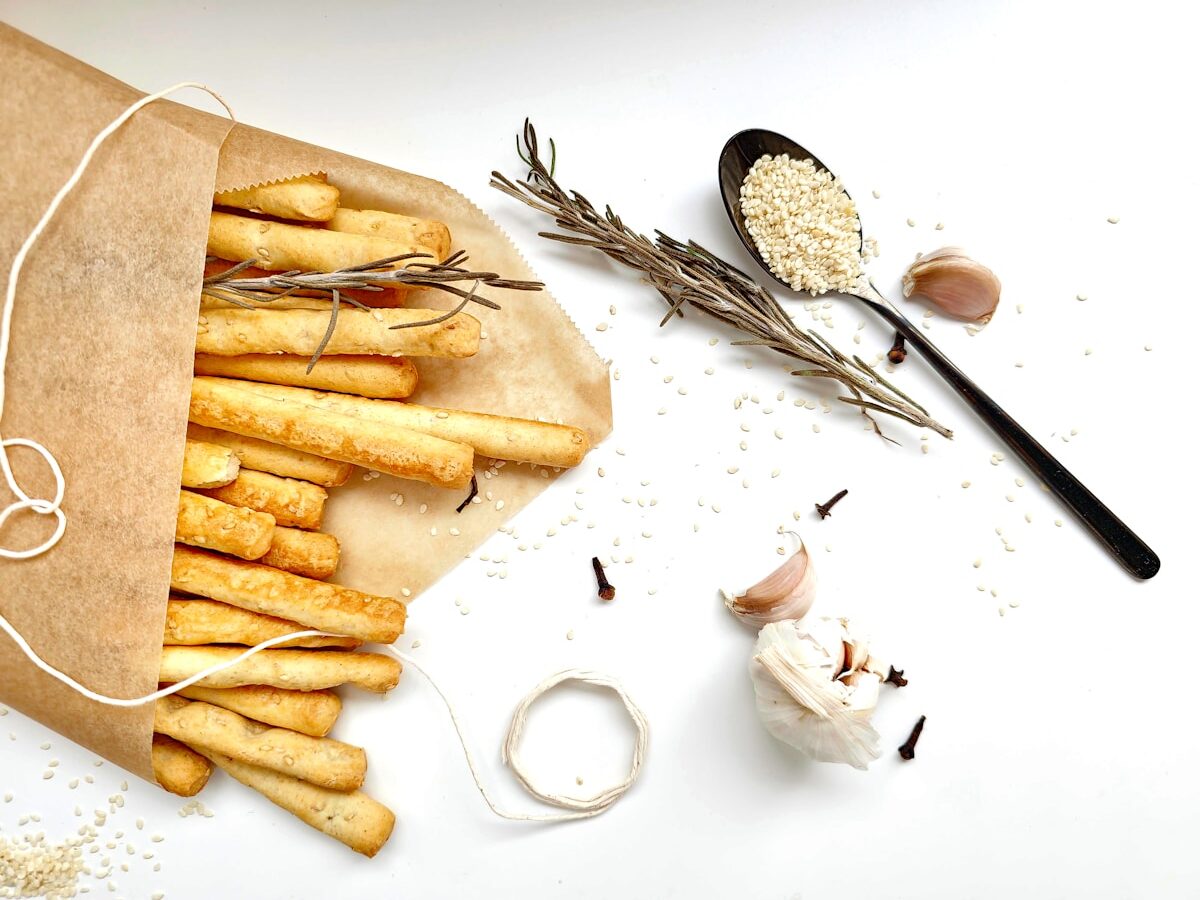 a bunch of french fries sitting on top of a cutting board